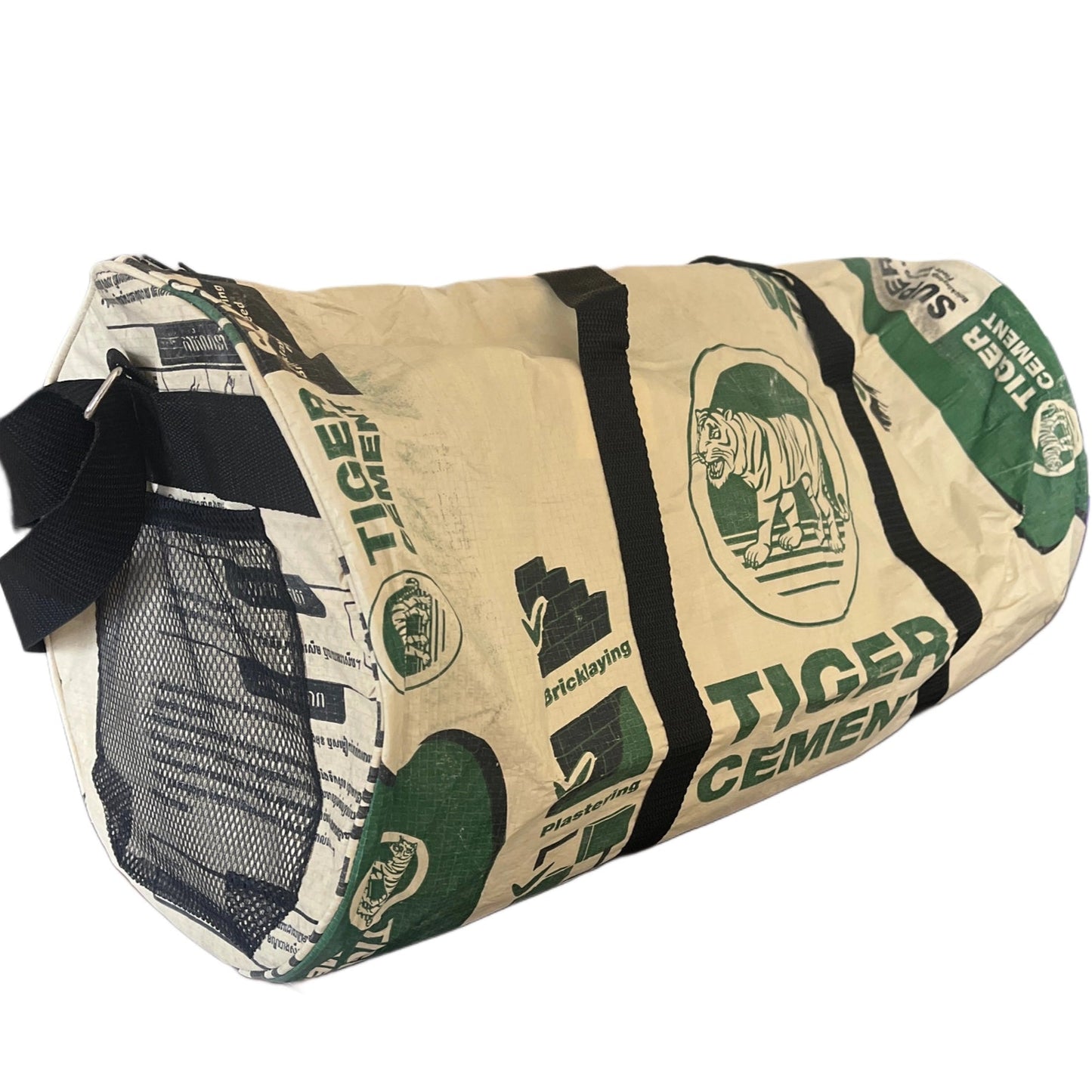 Recycled Tiger Cement bag with black straps on a white background