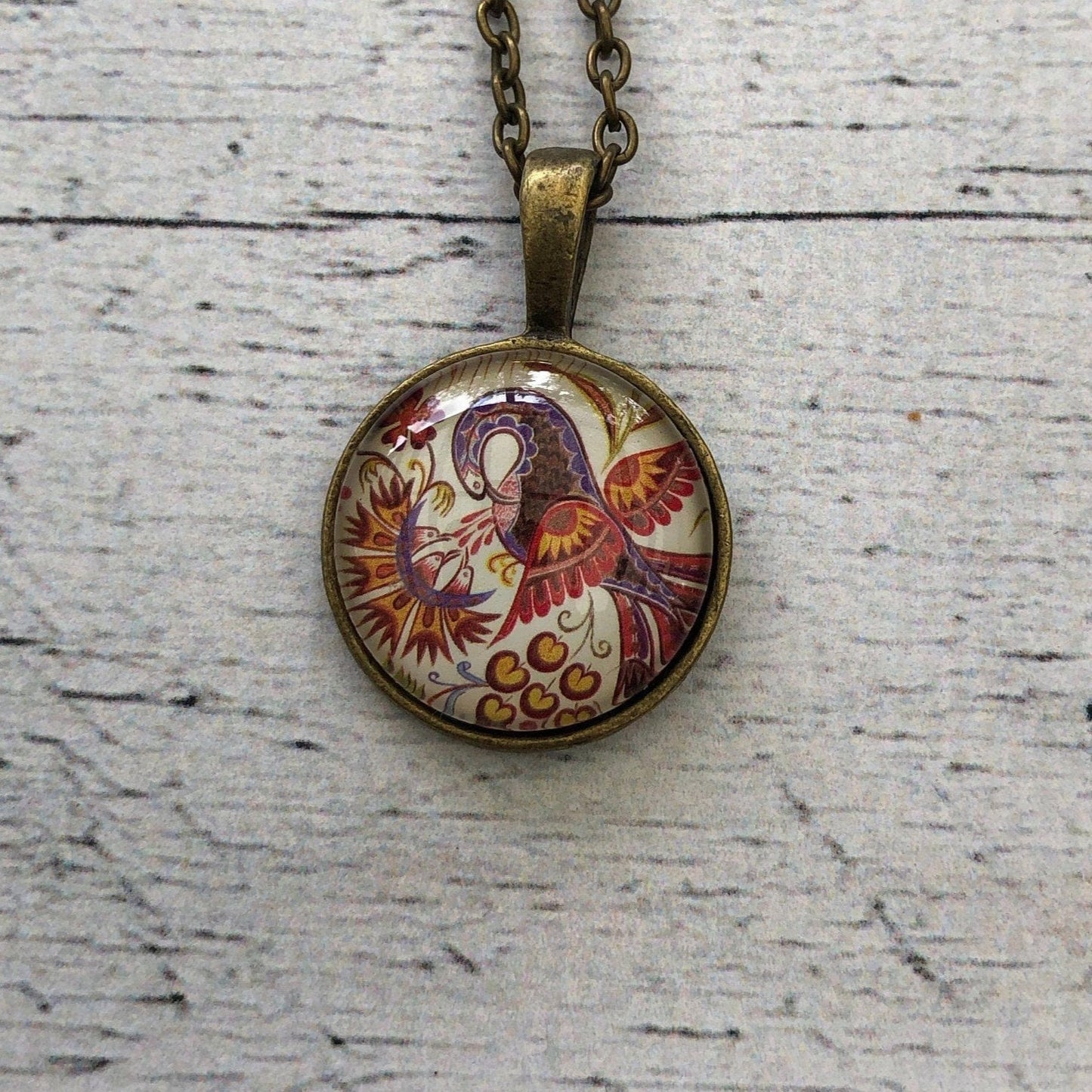 Postage Stamp Necklace - 2017 Slovakia Bird Folk Painting