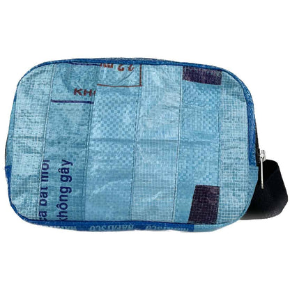Blue patchwork pouch with text on a white background