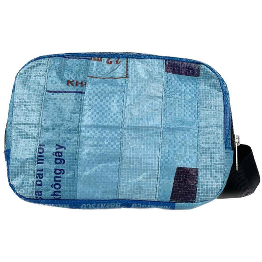 Blue patchwork pouch with text on a white background